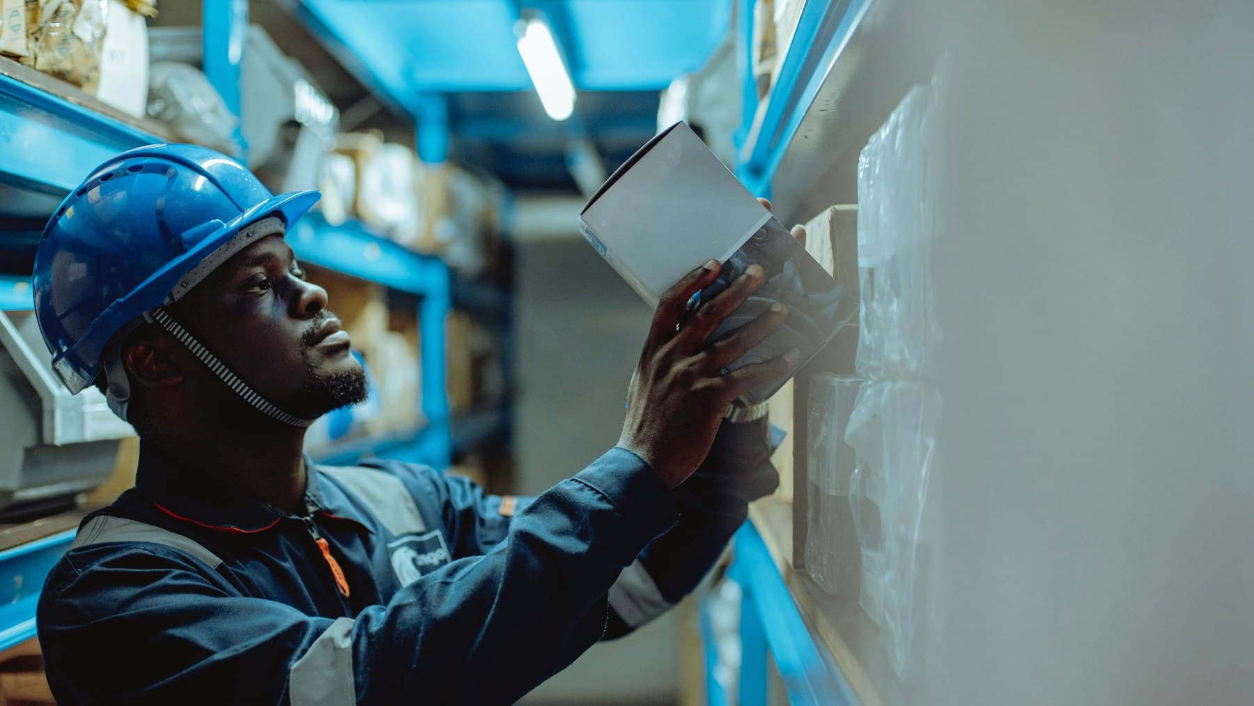 Warehouse operator scanning inventory at receiving